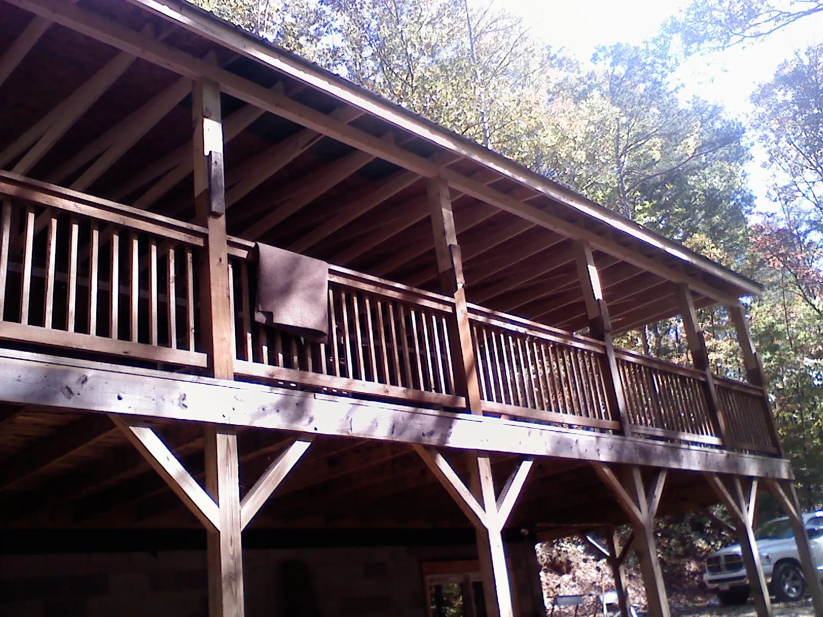 Timber framing under a new elevated porch and deck — Roof Leak Repair in Liberty Mills by Roofing Brothers